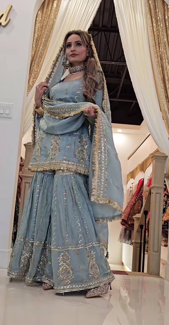 Luxurious sky outfit with sky accents and floral embroidery