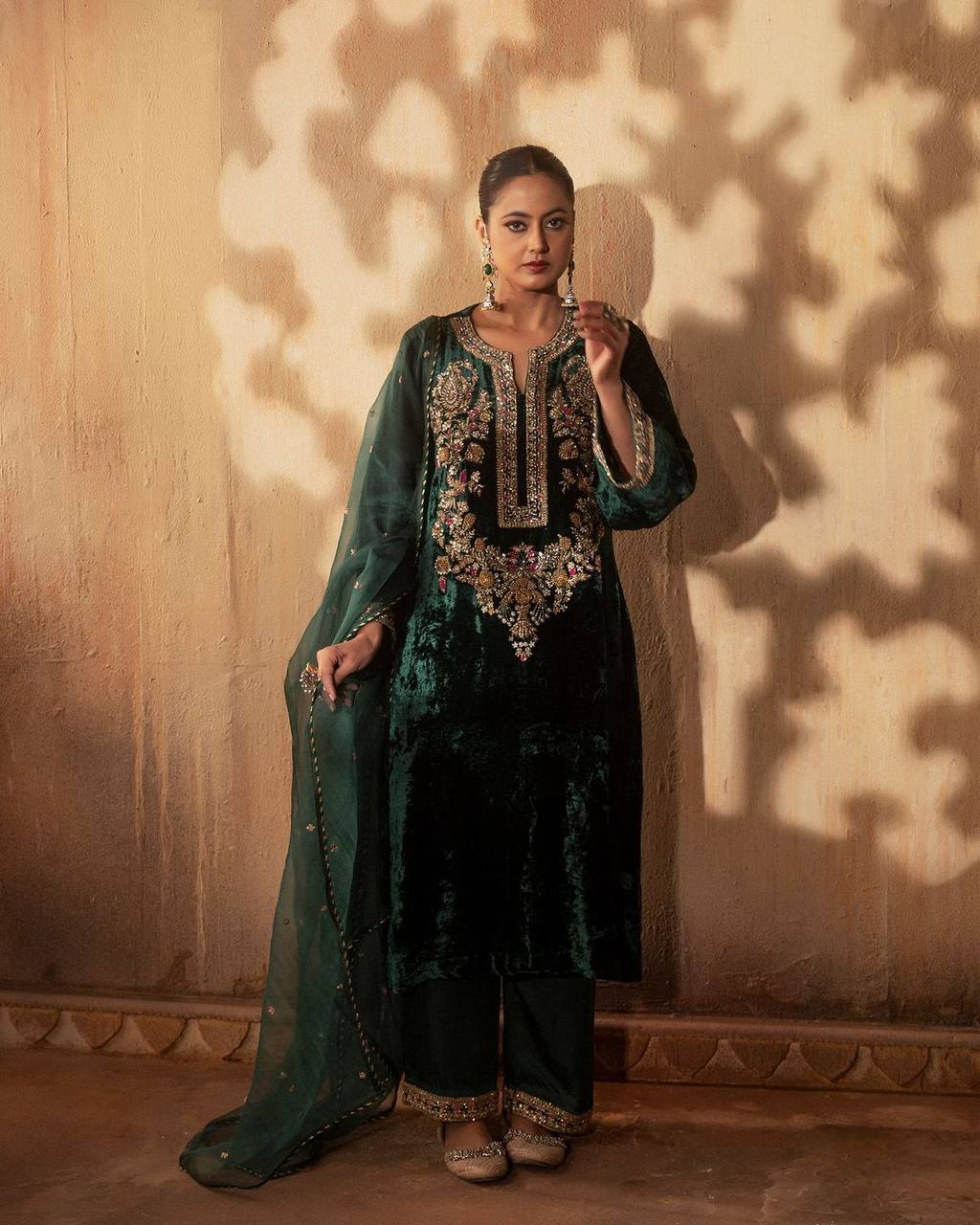 Green party wear outfit made from have pure  Viscous Velvet  with multi color embroidery work:-3024