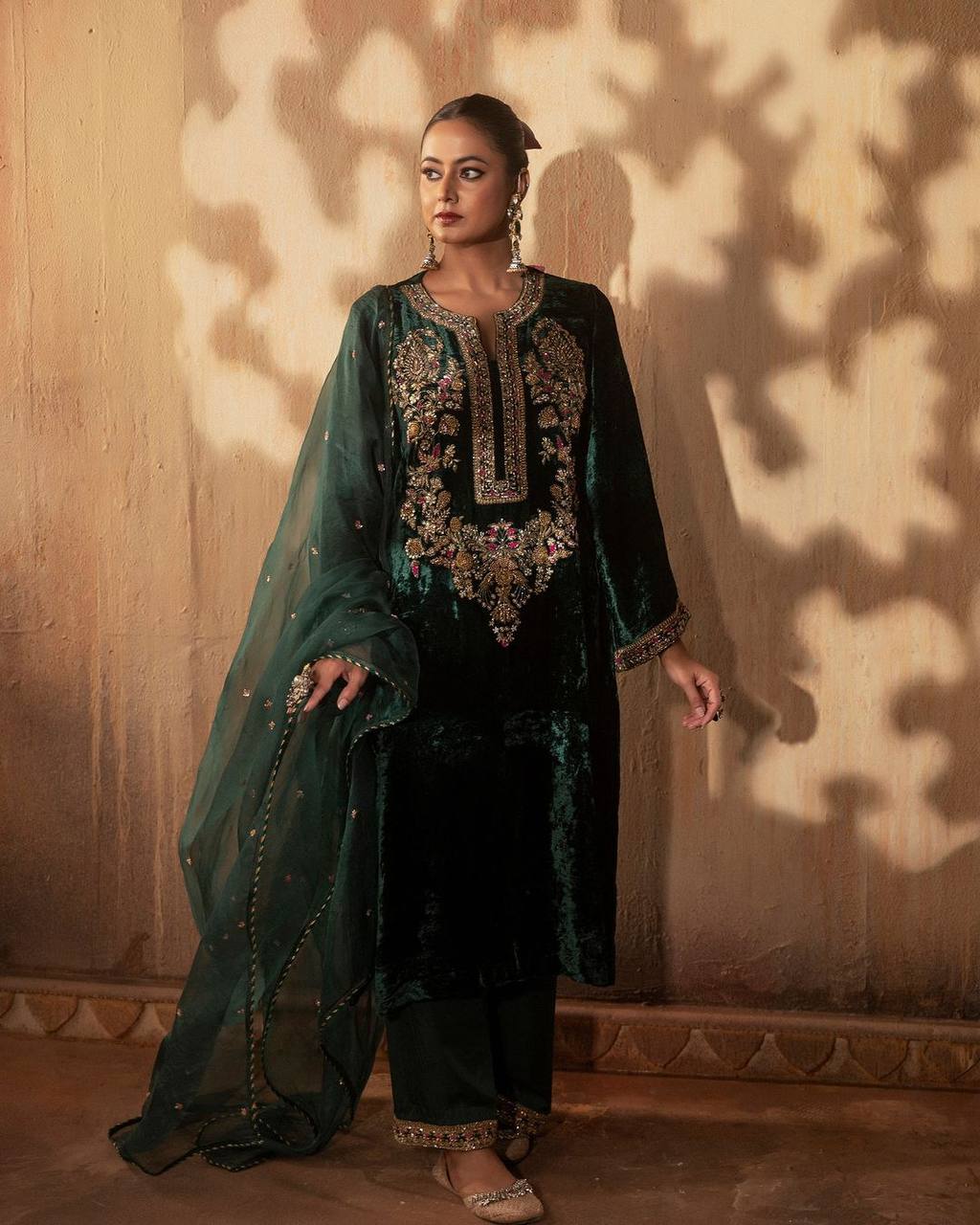 Green party wear outfit made from have pure  Viscous Velvet  with multi color embroidery work:-3024