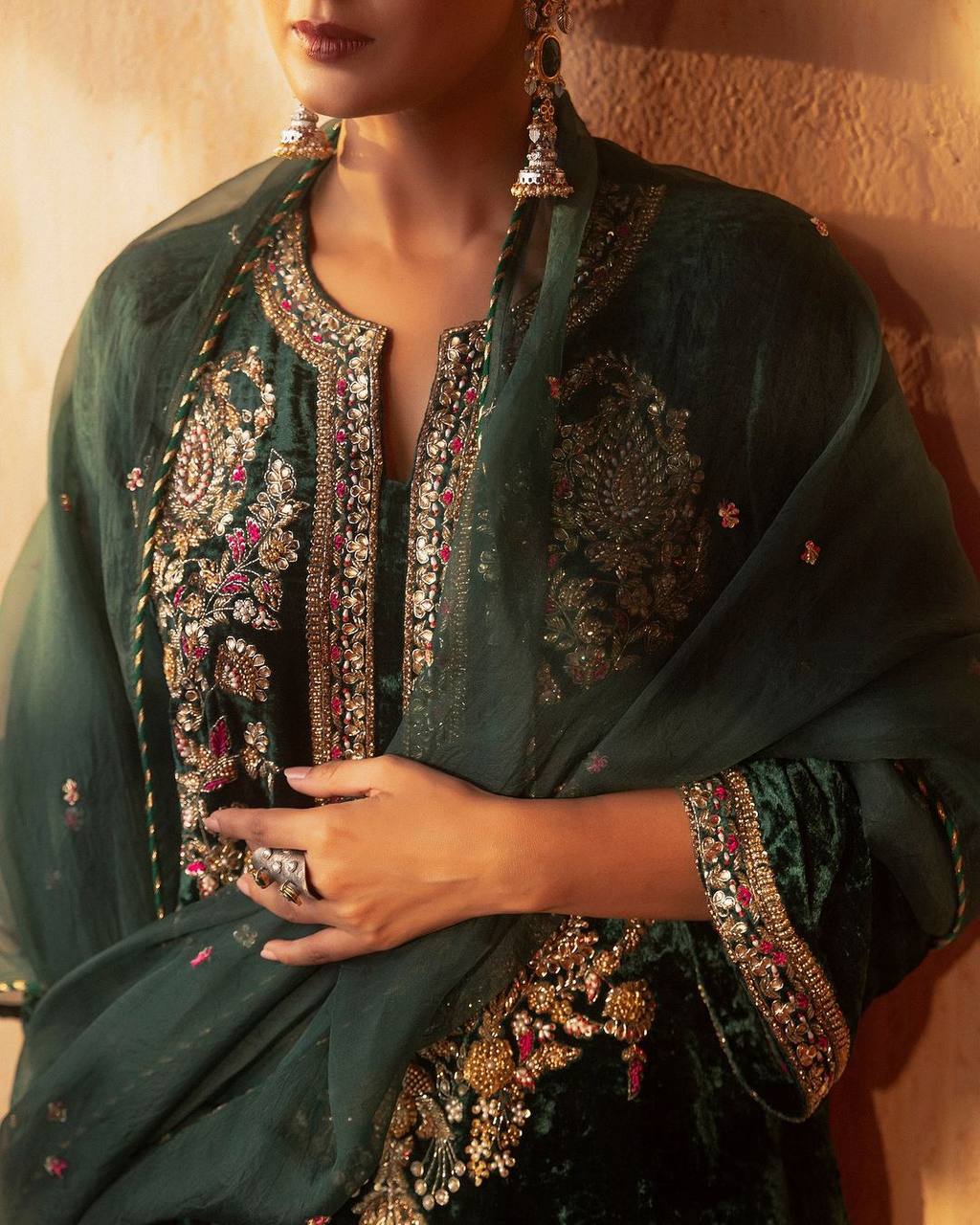 Green party wear outfit made from have pure  Viscous Velvet  with multi color embroidery work:-3024