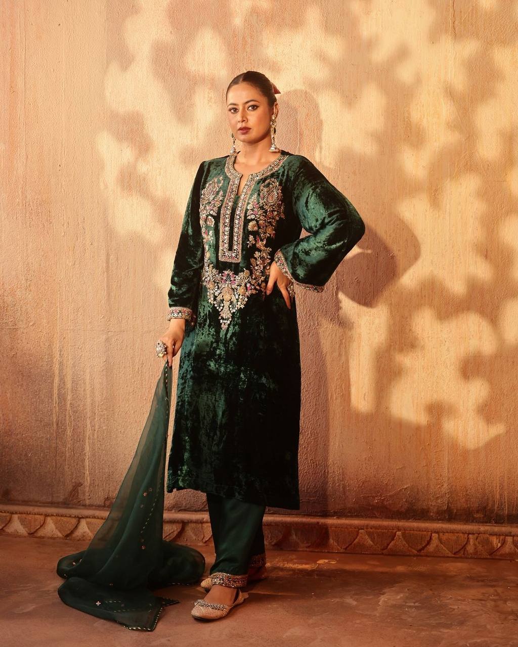 Green party wear outfit made from have pure  Viscous Velvet  with multi color embroidery work:-3024